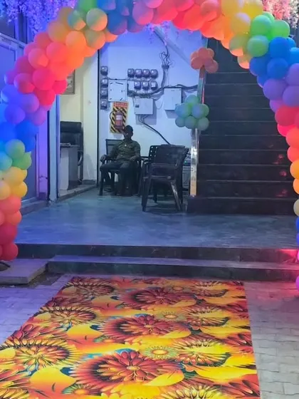A vibrant rainbow balloon arch makes for a grand entrance to this Cocomelon themed party. It sets a fun and festive mood right from the moment guests walk in.