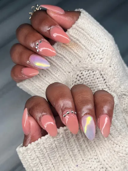 Another angle of the peach and chrome manicure, showing how the different elements come together for a look that is both soft and glamorous.