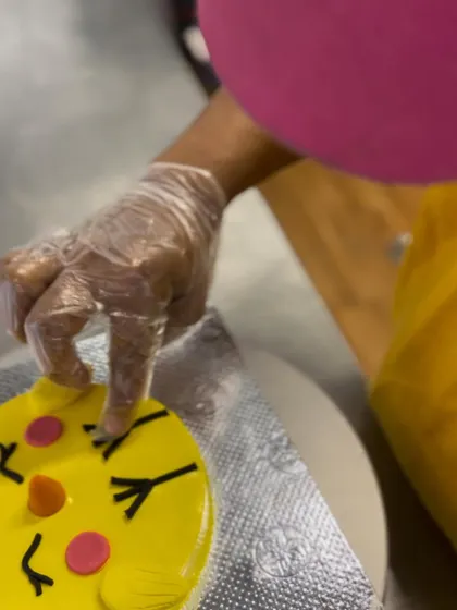 A duplicate of image 30, showing the making of an Easter cake.