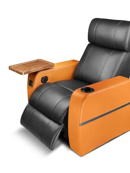 Comfort is key to the cinema experience. We offer a range of luxury home theatre recliners, like this model featuring premium leather, integrated cup holders, and a convenient swivel tray for snacks and drinks.