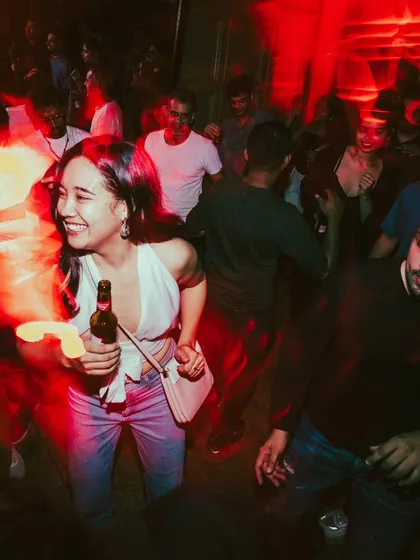 A candid moment of joy on the dance floor. This is what a good party looks like.