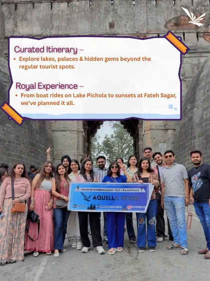 Our group posing at the entrance of a fort in Udaipur. Our curated itineraries take you beyond regular tourist spots to explore palaces, lakes, and hidden gems.