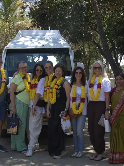 A warm, traditional welcome for our guests from the USA and France. They are greeted with fragrant garlands and refreshing coconut water to begin their two-week wellness journey.