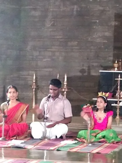 A closer view of the young musicians performing during the Pournami celebrations at the Ramana Shrine. Our students learn to perform in a traditional and reverent setting.