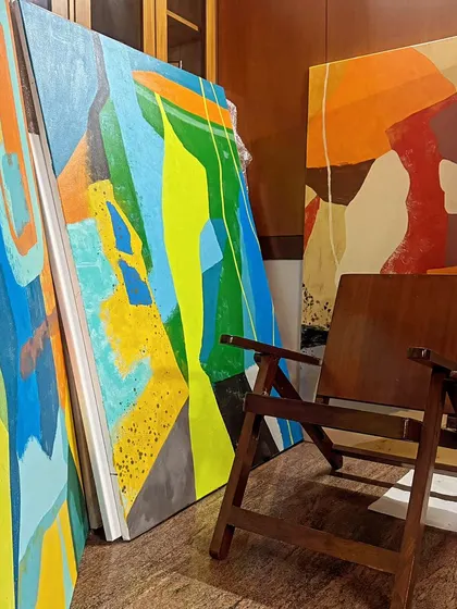 A glimpse of some large, vibrant abstract canvases in my studio. I use bold color-blocking with shades of blue, yellow, green, and orange to create energetic pieces that become the focal point of any room.