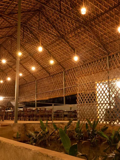 A wide shot of our dining area, showcasing the natural materials and open-air design that allows your team to dine while still feeling connected to the outdoors.