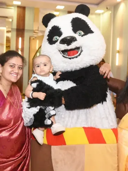 Guests love getting photos with the party mascot! A great memory from the celebration.
