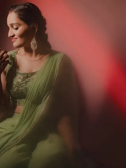 A soft and romantic portrait of the bride, with a red light leak effect adding a warm and artistic feel to the image.