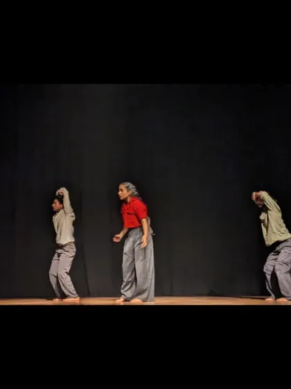 Three performers in a moment of synchronized movement during 'Sea's Fire', a production that blended contemporary dance with powerful theatrical narrative.