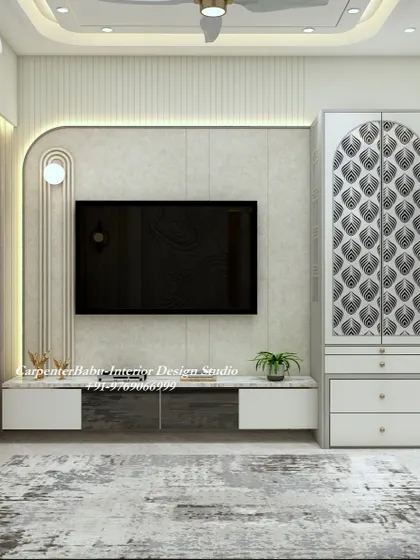 The TV unit in this living room is flanked by a tall, patterned storage cabinet, showing how to maximize storage vertically while maintaining a stylish look.