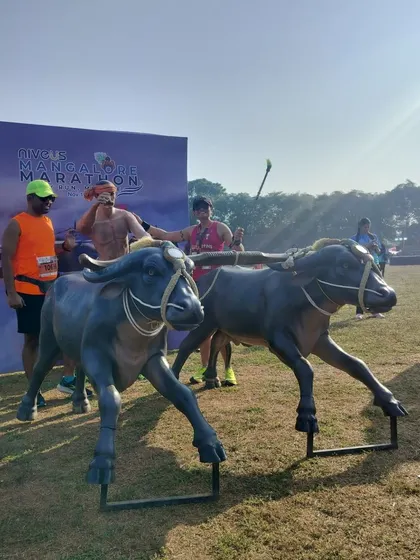 Having some fun with the Kambala-themed display at the Mangalore Marathon. We love how races incorporate local culture.