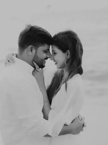 A beautiful black and white portrait. Removing the color helps to focus on the emotion and the gentle intimacy between them.