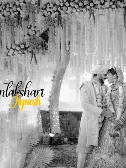A creative black and white portrait with a splash of color on the couple's names, adding a modern graphic touch to a classic wedding photo.
