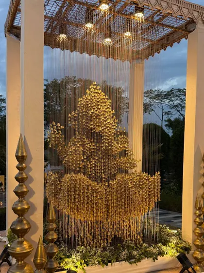 A magnificent 3D Ganesha installation made entirely of golden bells. This unique art piece served as a divine welcome, marking the evening with blessings and auspicious new beginnings.
