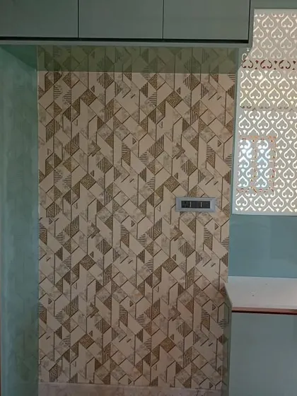 A similar 3D geometric pattern used as an accent in a custom cabinetry nook.