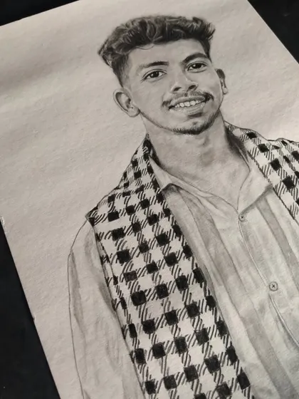 This paid portrait of a man with a checkered scarf was a commission from Chhattisgarh. I ship my artwork all over India.