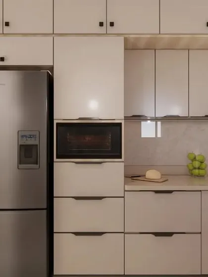 Another angle of the kitchen design, focusing on the seamless integration of the refrigerator and microwave oven into the cabinetry for a clean, built-in look.