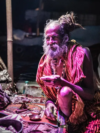 A quiet moment of reflection inside a tent. The unique lighting created a surreal, contemplative mood. My goal in travel photography is to find and frame these unstaged scenes that reveal the true character of a place and its people.