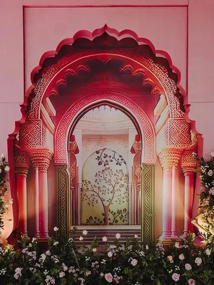 We brought the grandeur of Rajasthani palaces to this Sangeet stage. The backdrop features intricate arches inspired by Jaipur architecture, creating a royal and traditional setting for the pre-wedding celebration.