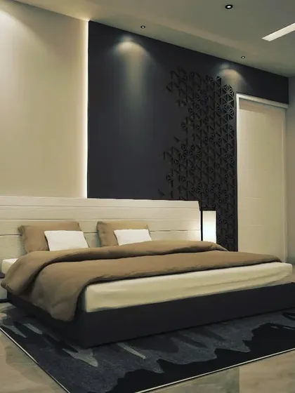 A minimalist bedroom concept with a focus on lighting. Spotlights highlight the textured accent wall, while sleek bedside lamps provide functional task lighting, creating a layered and balanced effect.