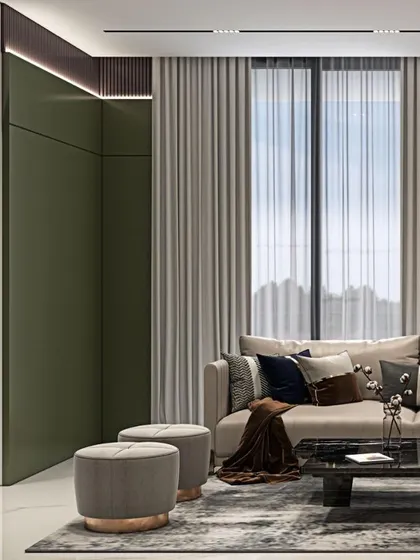 Prosperity begins with elegance. This living room corner from a contemporary fusion project in Pune uses a sophisticated palette of olive green and beige, with plush fabrics and clean lines.