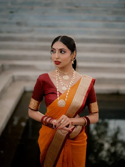 A portrait that captures a moment of anticipation. The bride's gaze is directed away from the camera, creating a sense of story and wonder.