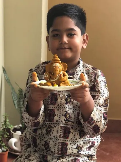 This student's turmeric Ganesha is beautifully formed, showing the skill and concentration he developed through practical life and art activities.