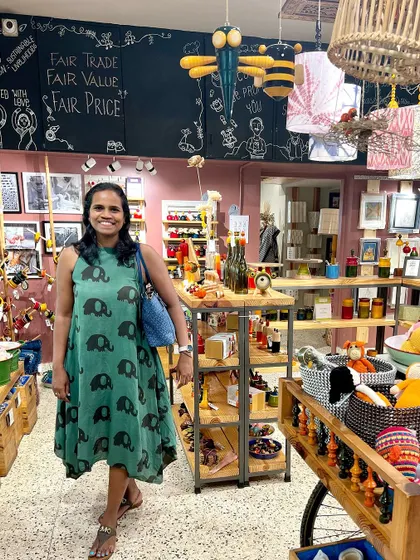 A happy customer in our Indiranagar store, wearing one of our elephant-print dresses. She shares her experience of shopping with us, highlighting the joy of finding ethically sourced, handmade products for the whole family under one roof.