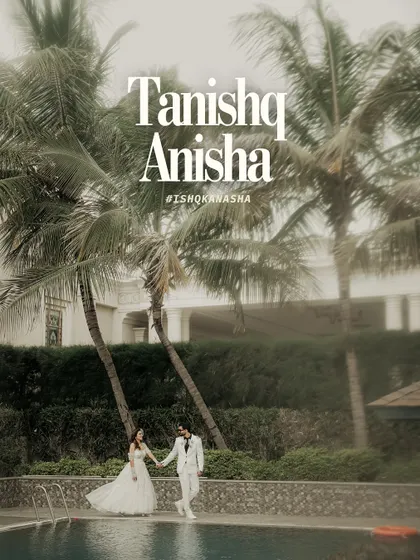 A modern fairytale moment. The couple walks hand-in-hand by the poolside, framed by palm trees, perfectly capturing the essence of a chic destination wedding.