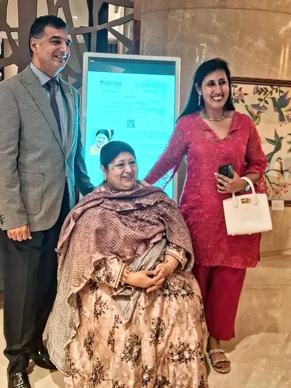 A proud moment at the 'Art Soirée' with artist Badrunissa Irfan and guests at the Conrad Bengaluru.