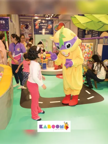 A sweet interaction between a little girl and our mascot, Super K. These are the heartwarming moments we love to create.