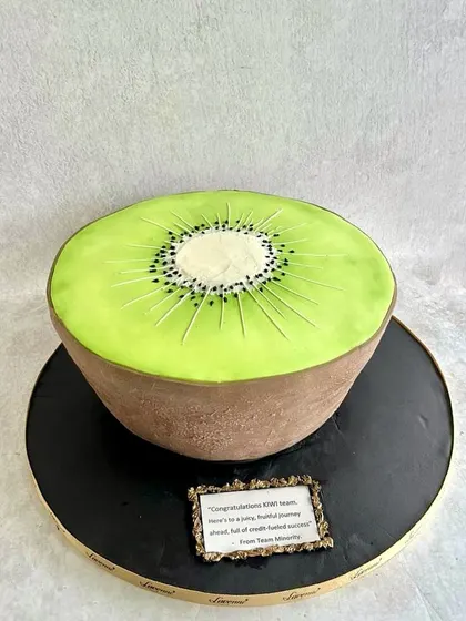 This was a fun and unusual request: a giant kiwi cake! We created this 5kg cake to look exactly like a sliced kiwi, and the team did an amazing job, especially with less than 24 hours' notice.