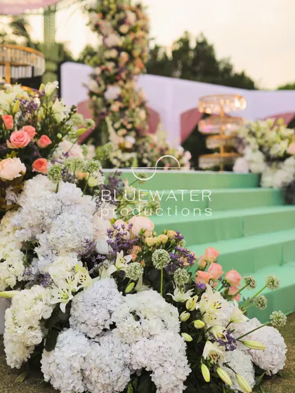 Another beautiful shot of the flowers cascading down the steps of the mandap.