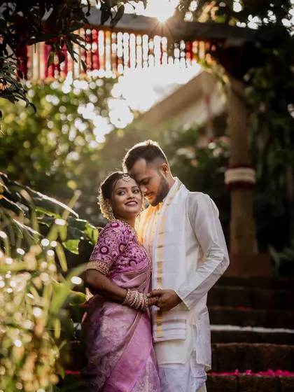 A playful and romantic moment on the steps of The Peacock Grove. We encourage our couples to be themselves, which allows us to capture their unique personalities and connection.