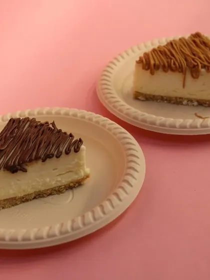 Our eggless Nutella and Lotus Biscoff cheesecakes side-by-side, showcasing their distinct toppings and creamy texture.