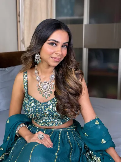 A beautiful portrait showing the soft brown smokey eye. This is a more subtle take on the classic smokey eye, perfect for a sophisticated sangeet look.