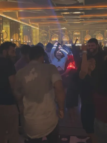 A candid shot of the dancefloor, where someone is completely lost in the moment. These are the personal experiences that make up a great collective party.