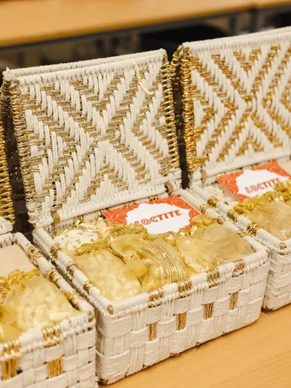 The complete look of the Loctite Diwali gift boxes. The combination of the woven texture, gold accents, and branded tag makes for a truly premium and memorable festive gift.