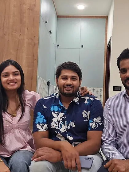 A happy moment with our clients in their new home. Seeing them settled and happy in a space we created together is the most rewarding part of our job.