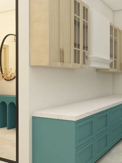 This custom crockery unit was designed for the ATS Nobility dining space. The dual-tone finish with teal and light wood connects it to the rest of the home's color scheme, providing ample storage with a stylish look.