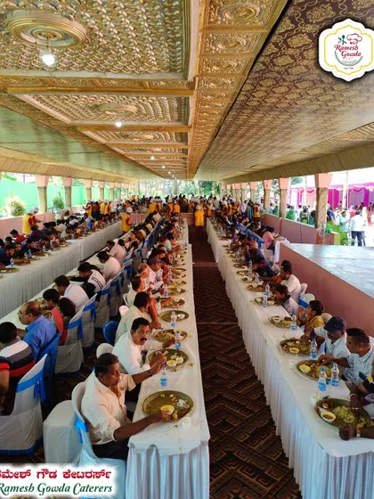 A full house at a wedding reception. The long rows of guests enjoying their meal show the scale of events we handle regularly.