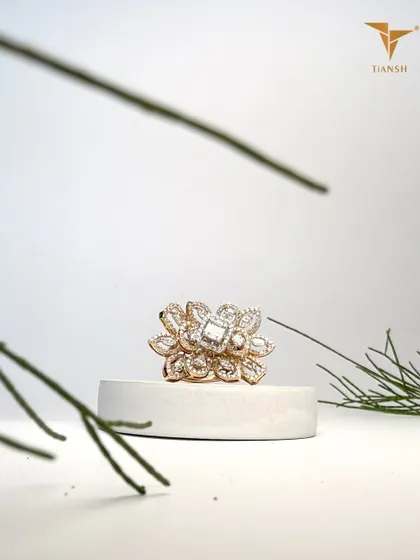 A bloom of brilliance. Marquise, round, and emerald cut diamonds are set in harmony in this ring, carrying the geometry of nature and the glow of forever.