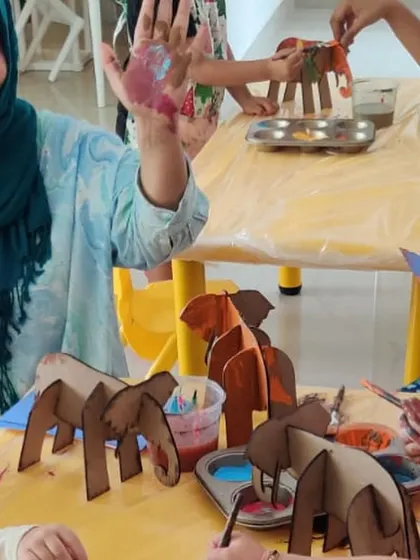 A collection of moments from our "Elmer's Art Party." Children and parents got messy painting their own 3D elephants, creating patchwork art, and exploring different textures. It was a joy to see families creating together.