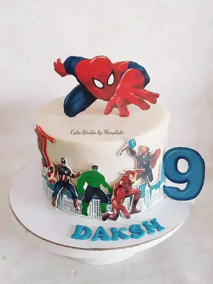 All the Avengers assembled on this cake for a 9th birthday. This design features Spider-Man, Captain America, Hulk, and more, perfect for a superhero fan.