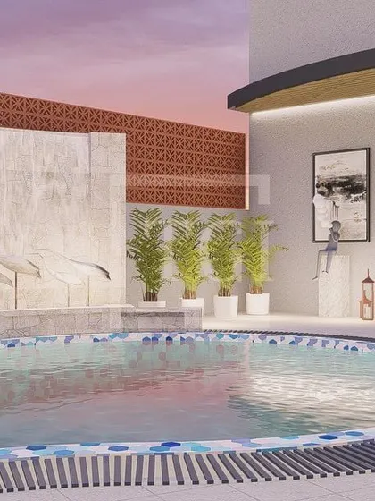 A custom water feature designed for the hotel pool area in Bhubaneswar. The wall incorporates a subtle, elegant sculpture of birds, adding an artistic touch to the tranquil environment.