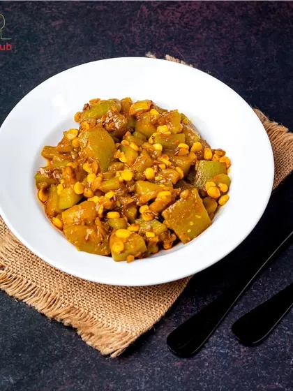 A flavorful masterpiece made from the humble lauki (bottle gourd) and hearty chana dal. This sabzi is low in calories but high in nutrients.