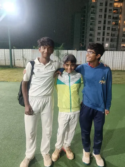 Friends and teammates. Three of our players, selected for the U-14 KSCA zonal tournament, share a moment after a training session.
