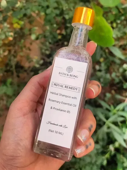 A mini bottle of our Royal Remedy Herbal Shampoo, featuring rosemary essential oil and provitamin B5. This was part of a custom gift set, perfect for travel or trial.