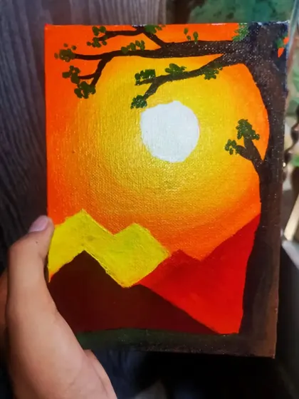 Ishan, an 8th standard student, captured a brilliant sunset using acrylics on a small canvas. The bold colors and silhouette of the tree create a very dramatic landscape.