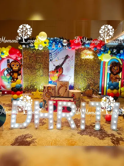 Another view of the music party stage, this time with a gold sequin backdrop adding a touch of glam to the fun, musical vibe.